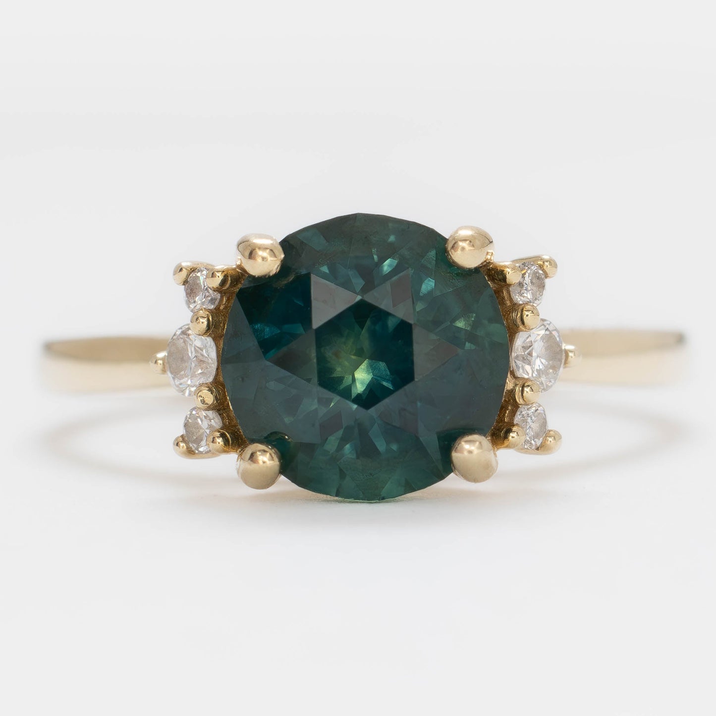 eclipse accented engagement ring with round blue-green montana sapphire
