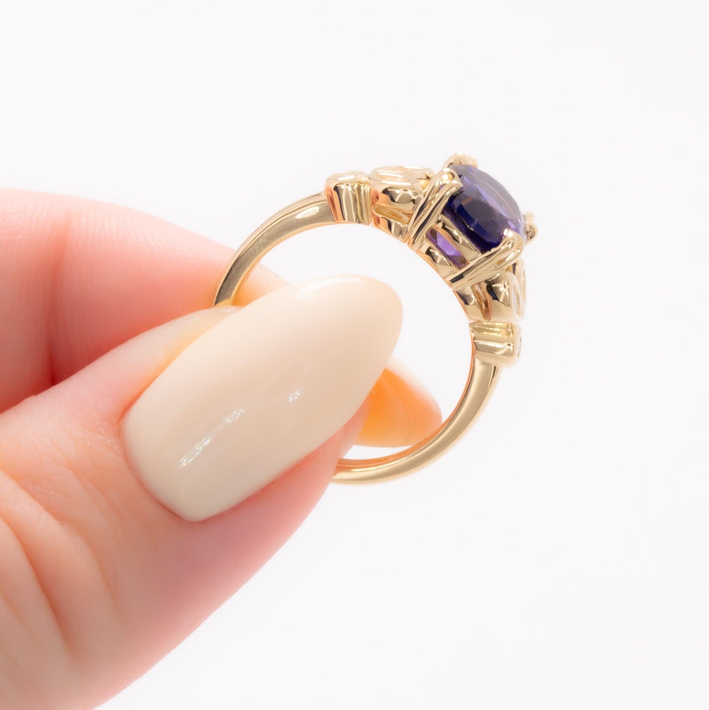 eloise engagement ring in yellow gold with oval purple lab sapphire