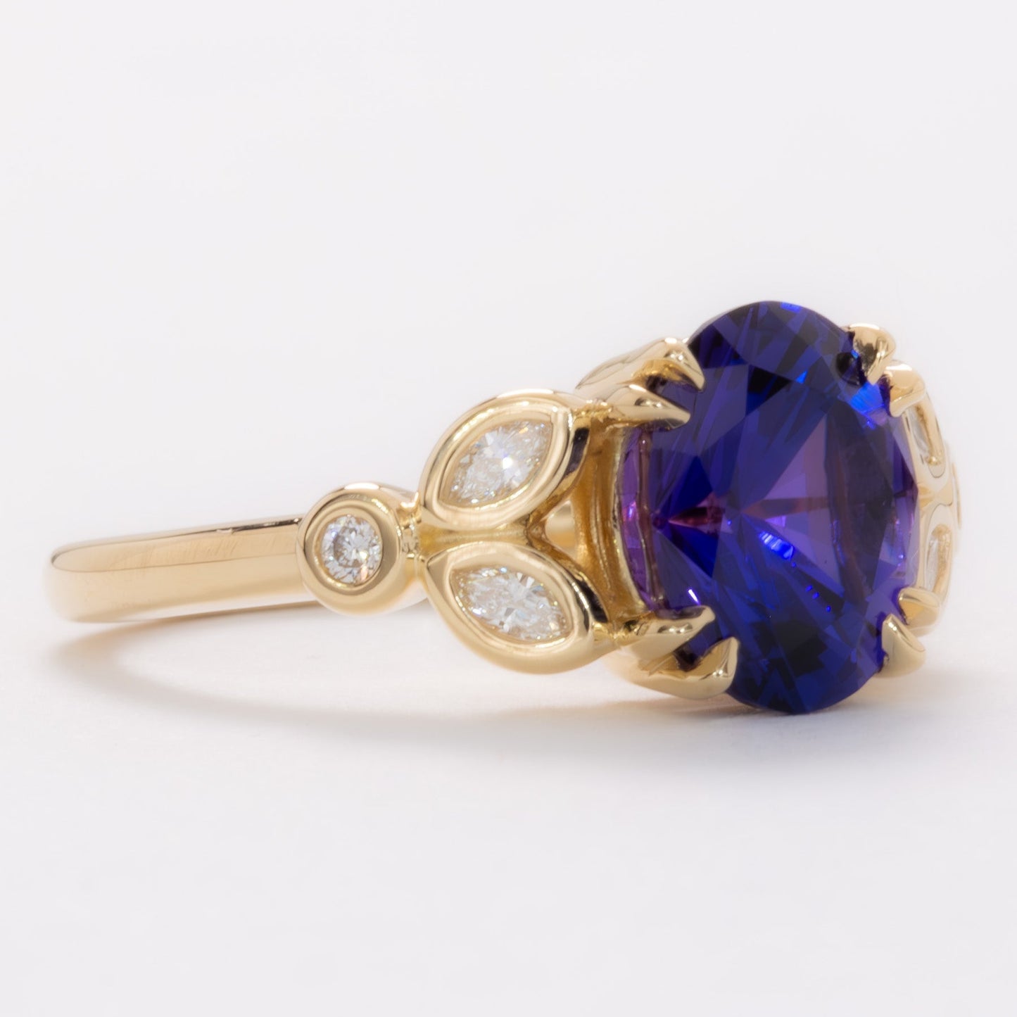 eloise engagement ring in yellow gold with oval purple lab sapphire