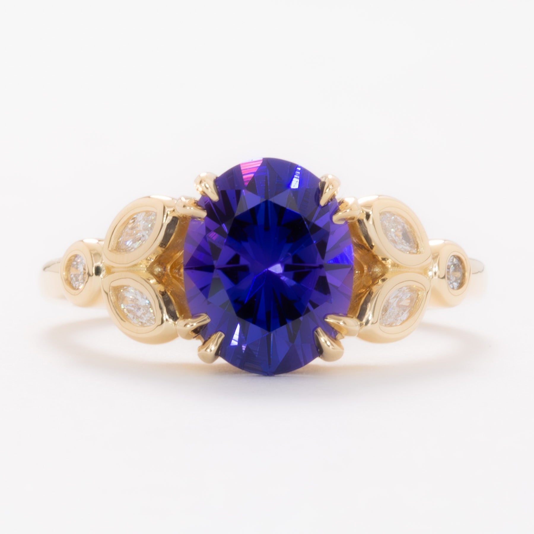 eloise engagement ring in yellow gold with oval purple lab sapphire