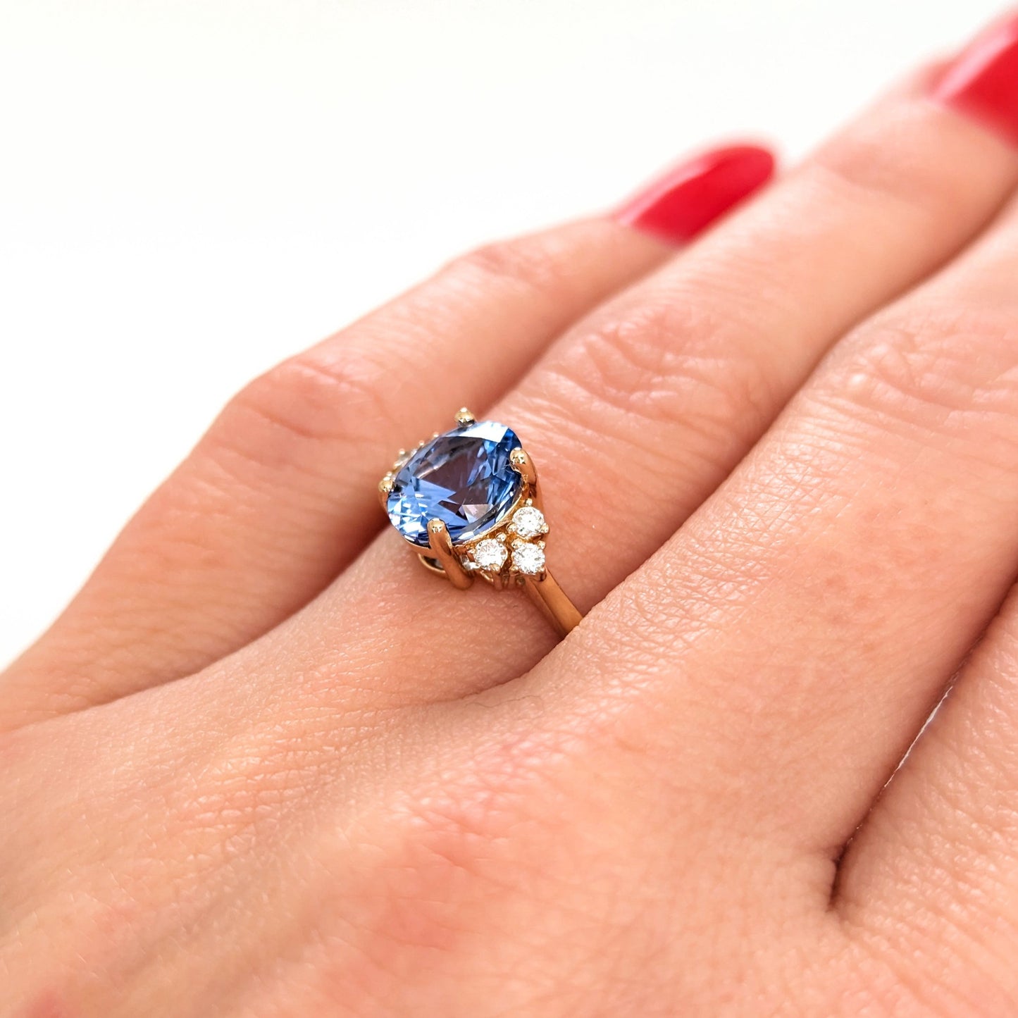 esilda engagement ring yellow gold and blue lab sapphire
