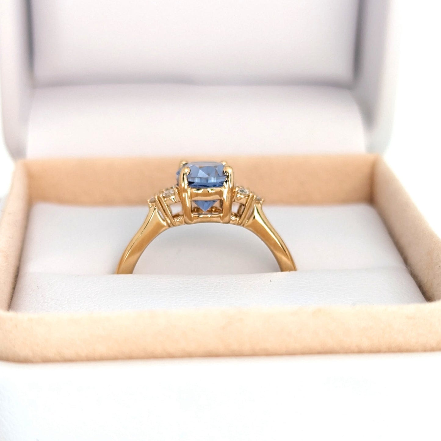esilda engagement ring yellow gold and blue lab sapphire