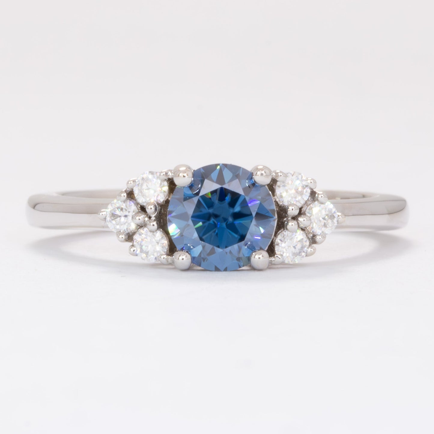 esilda ring with round blue moissanite