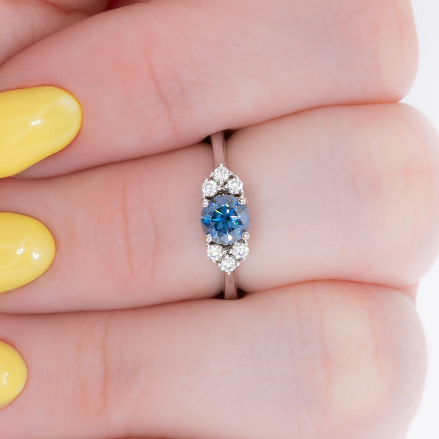 esilda ring with round blue moissanite