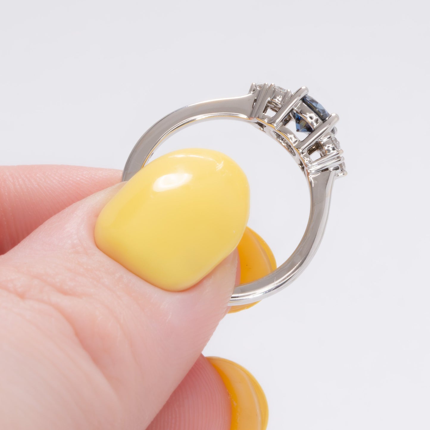 esilda ring with round blue moissanite