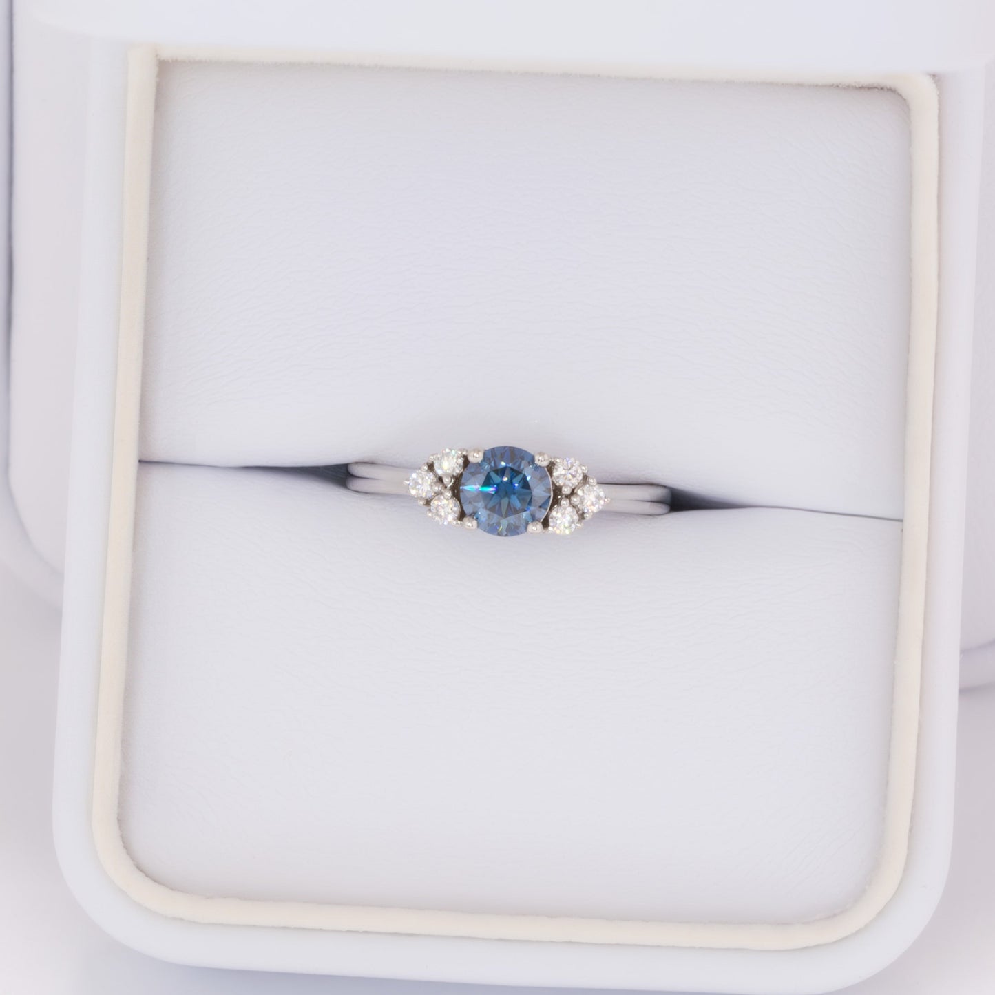 esilda ring with round blue moissanite