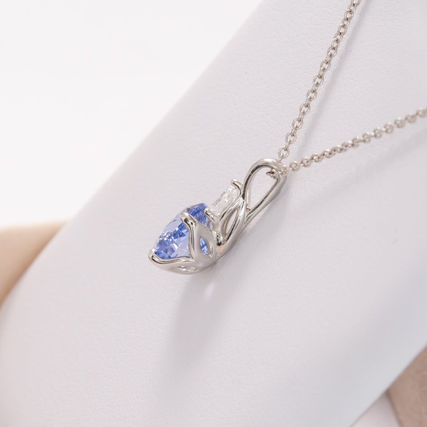 esther necklace in white gold with blue oval lab sapphire