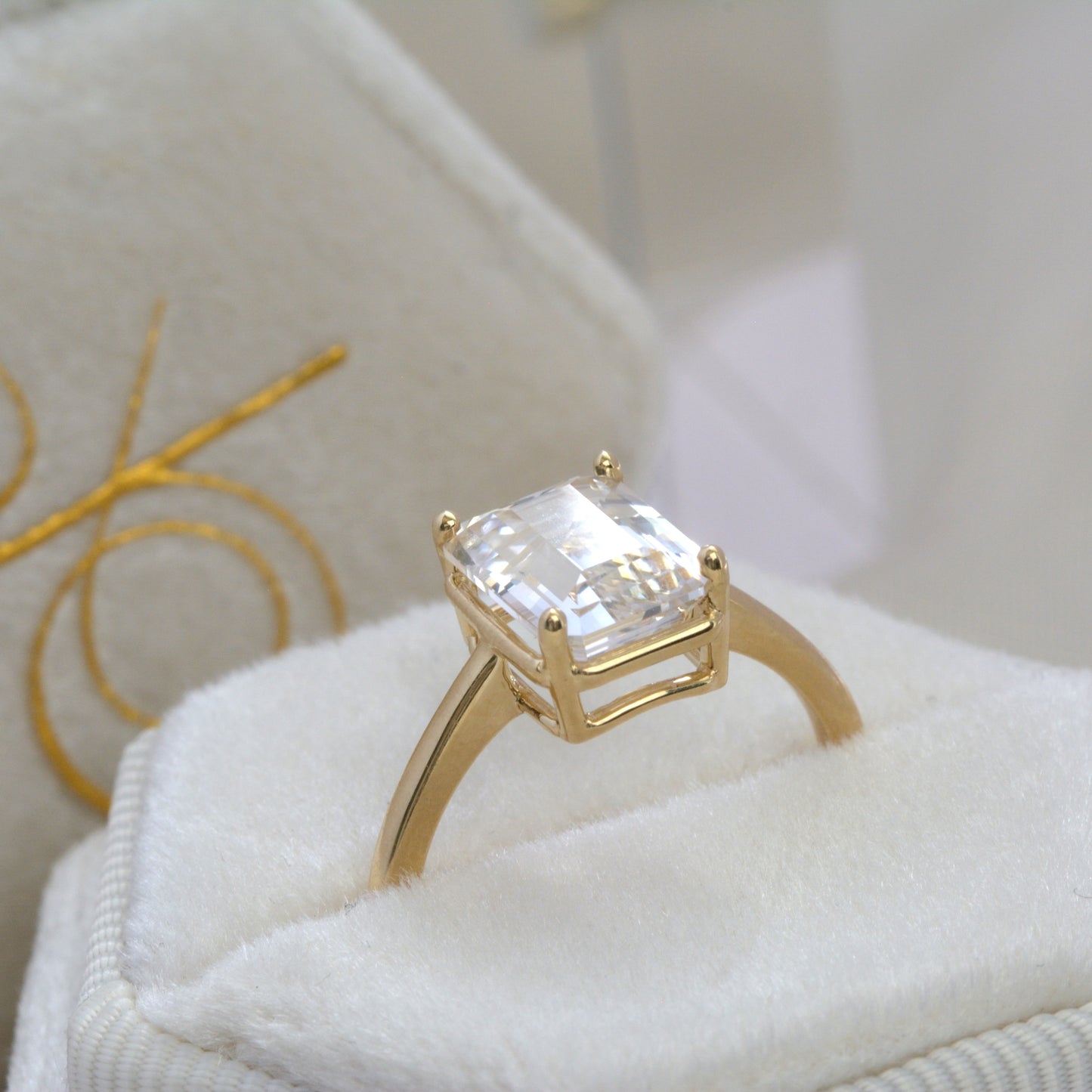 faux bezel engagement ring with lab sapphire