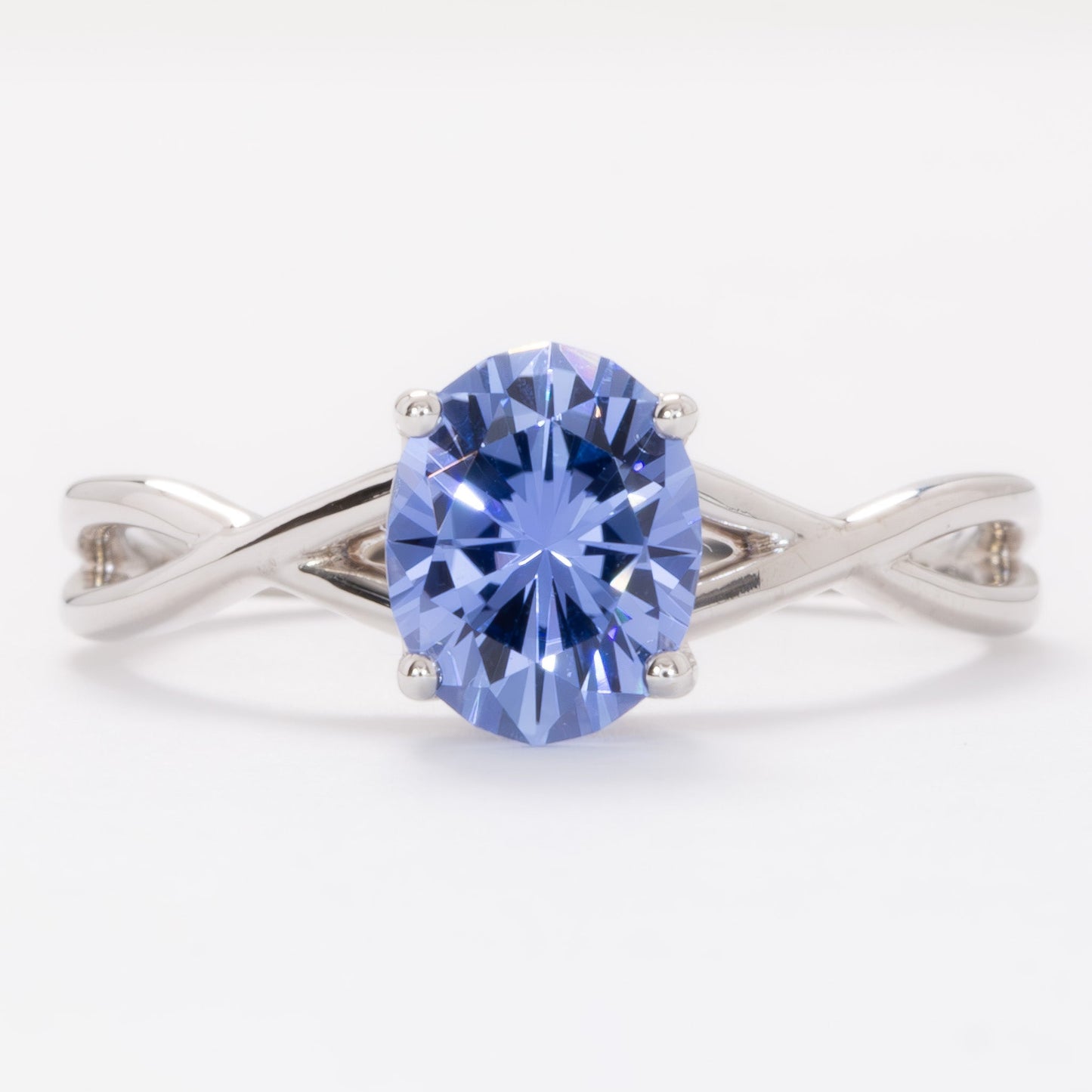 fifer engagement ring in white gold with blue oval lab sapphire