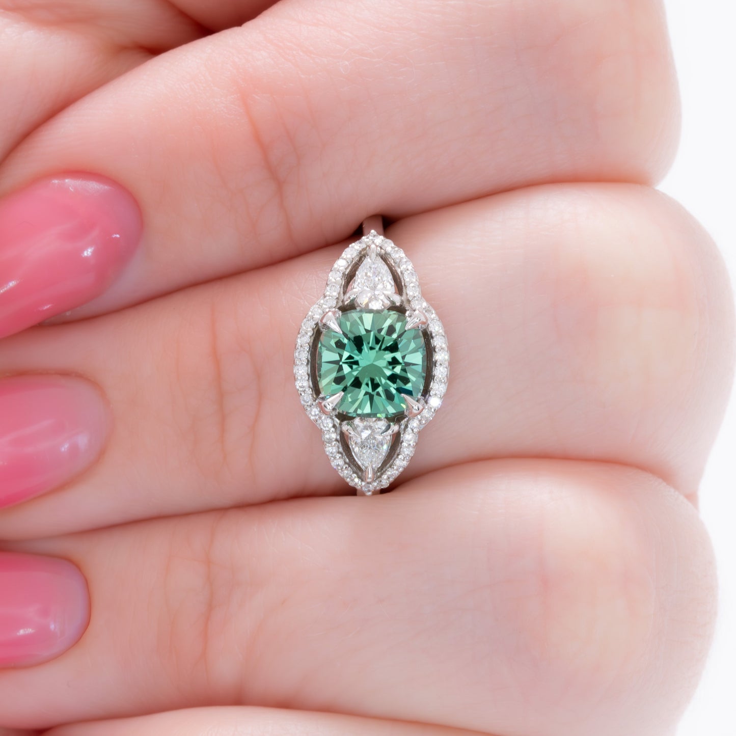 gayle three stone halo engagement ring with cushion green lab sapphire