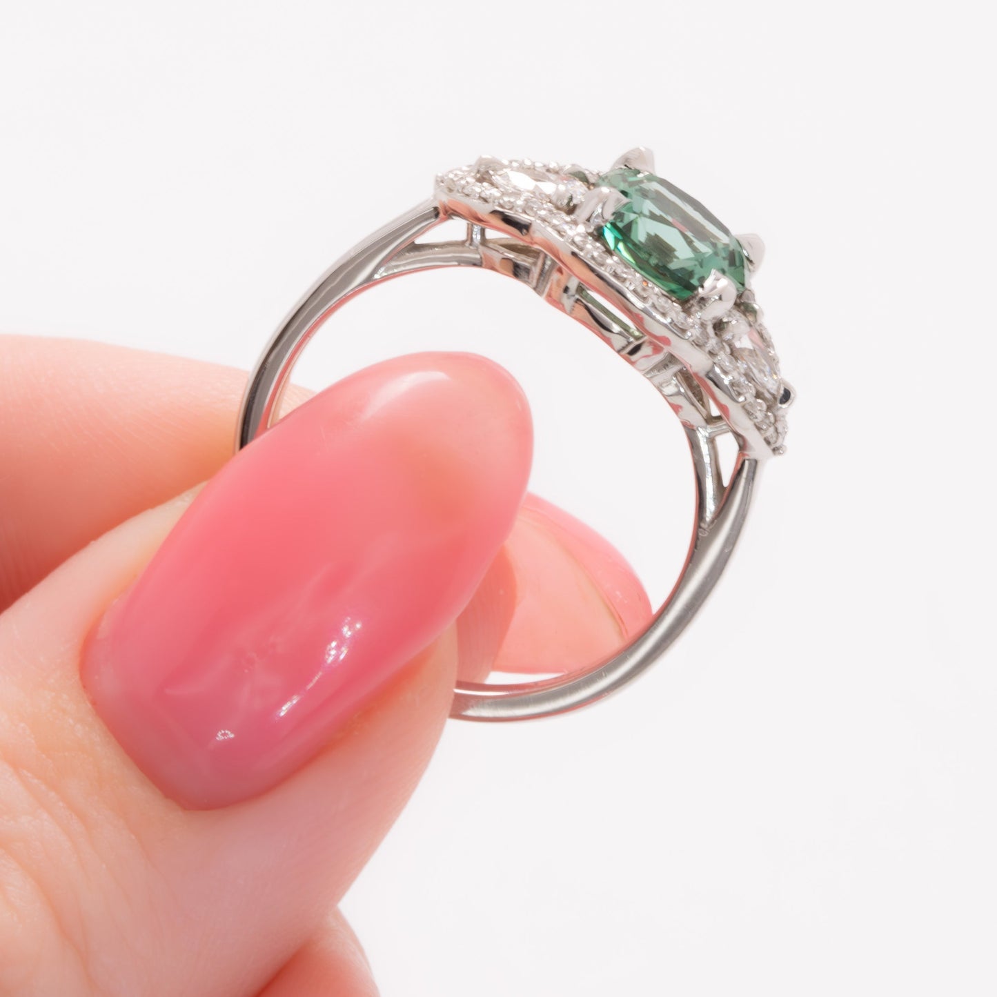 gayle three stone halo engagement ring with cushion green lab sapphire