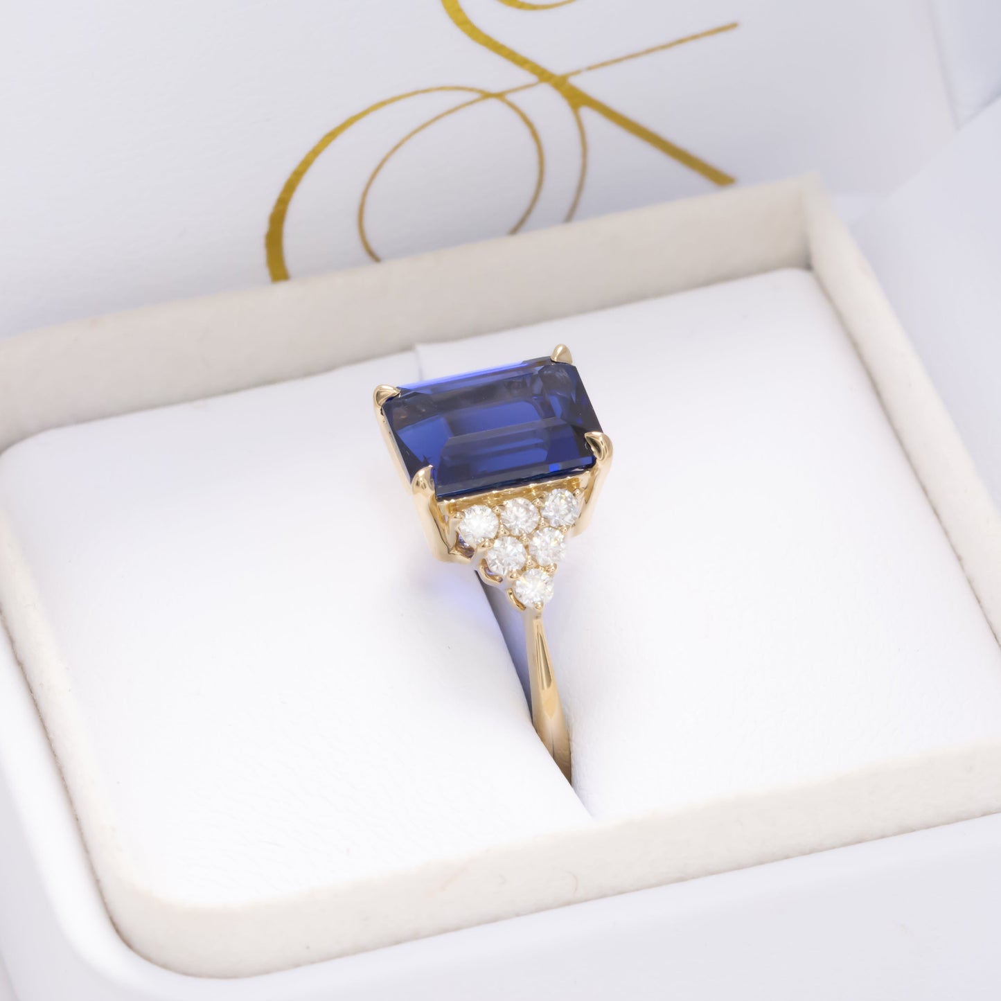 hayden engagement ring with royal blue lab sapphire step cut