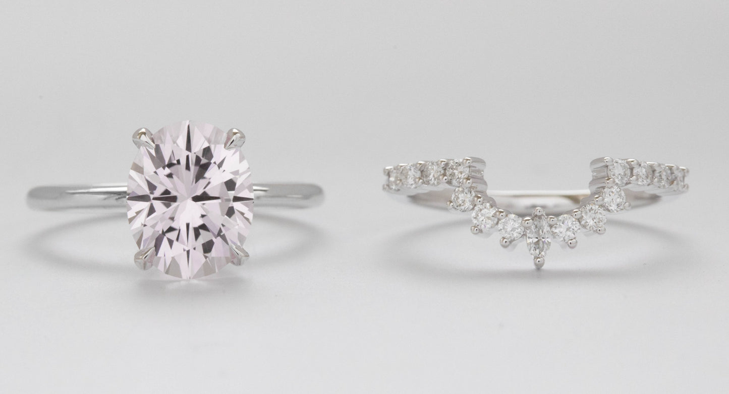 hidden halo wedding set with lab sapphire and diamonds