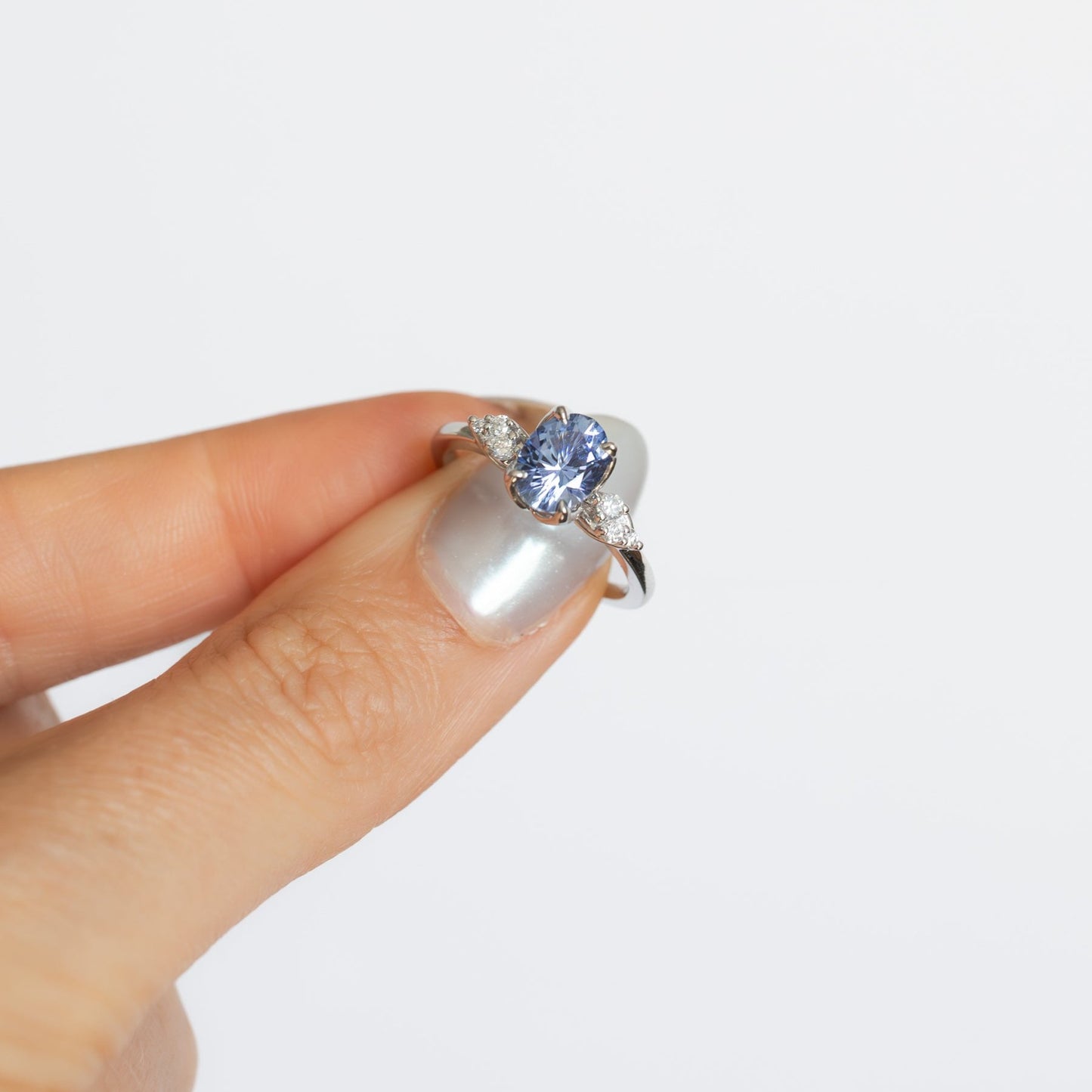 isla engagement ring with blue lab sapphire