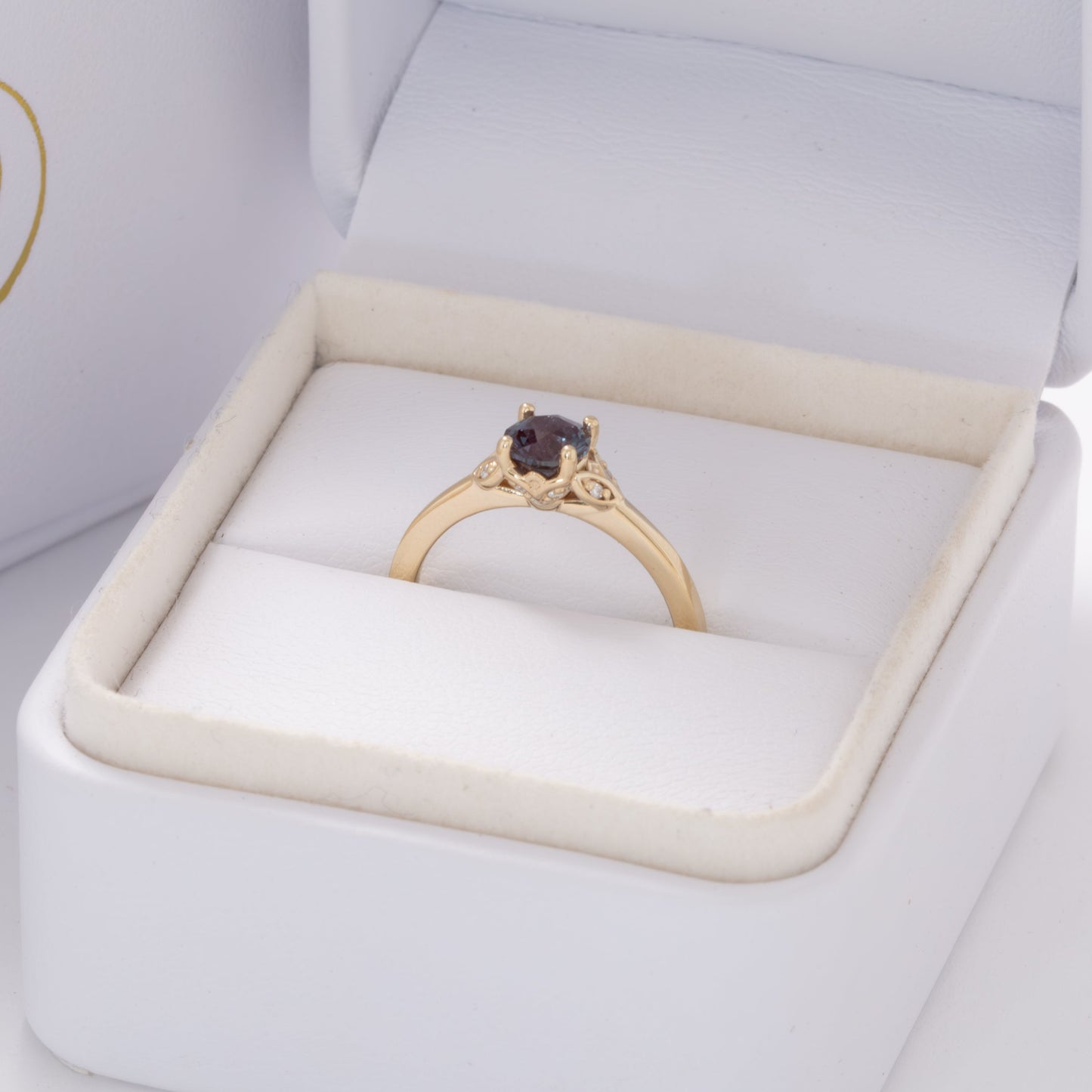 krystal floral inspired engagement ring with round lab alexandrite