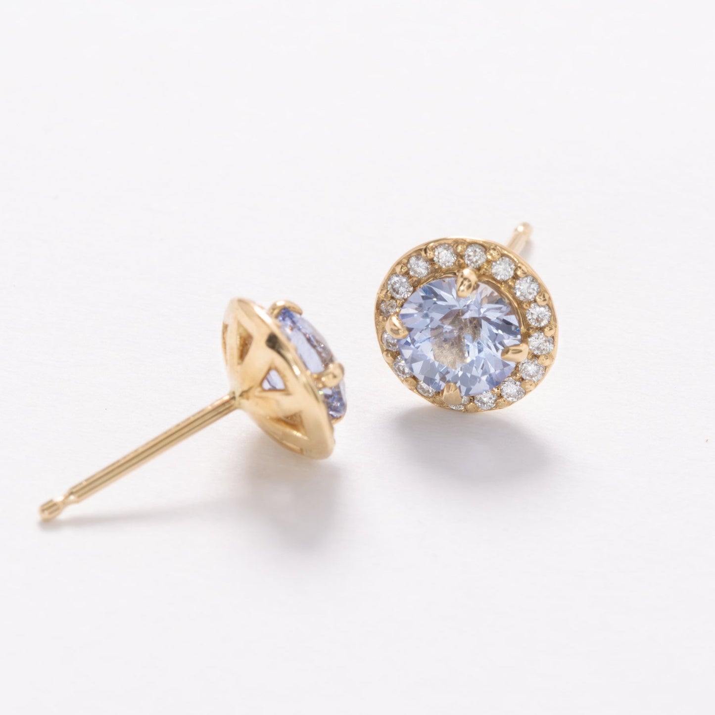light blue lab sapphire halo earrings