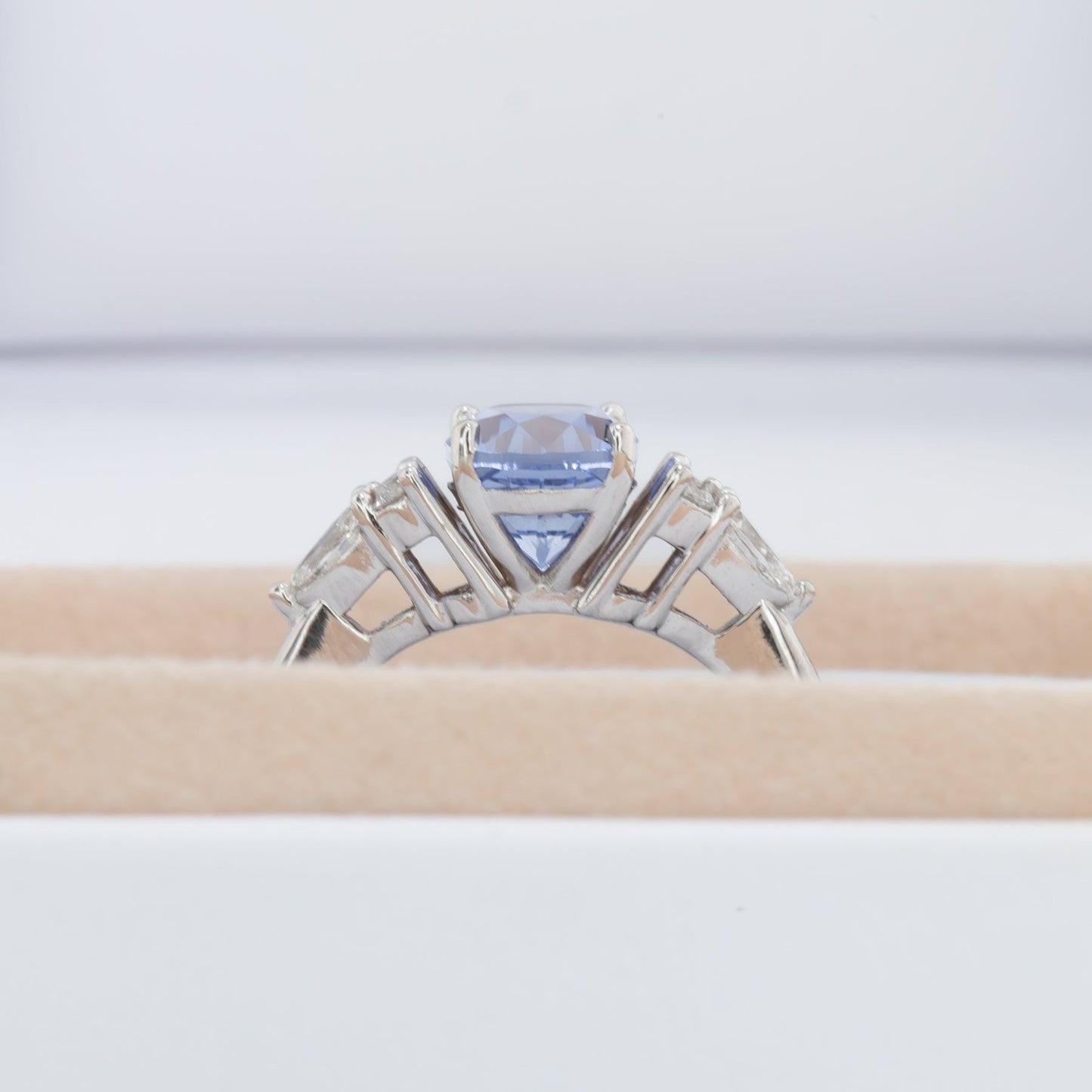 light blue oval engagement ring with lab diamonds