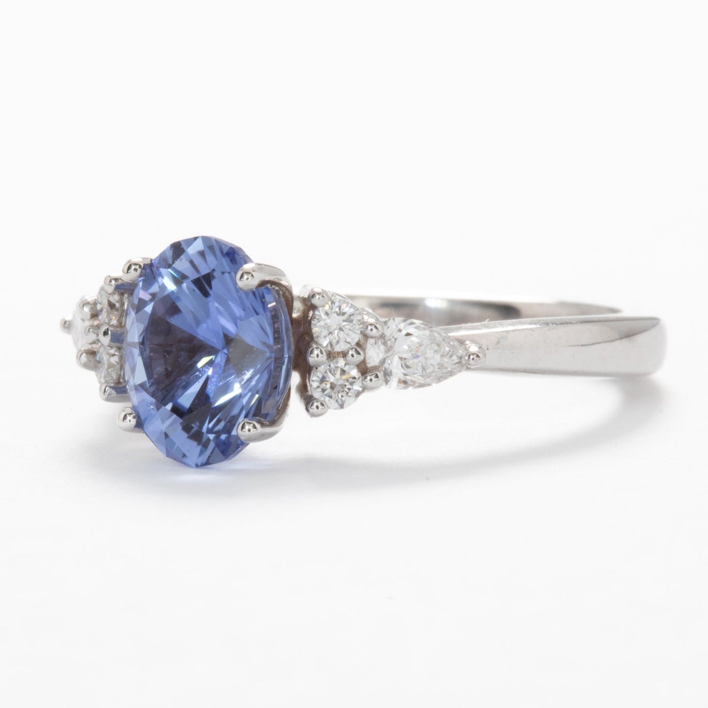 light blue oval engagement ring with lab diamonds