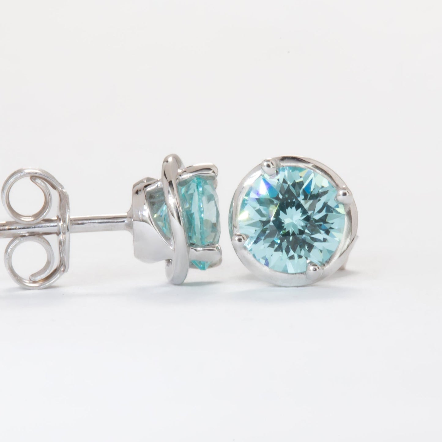light blue yag earrings in white gold