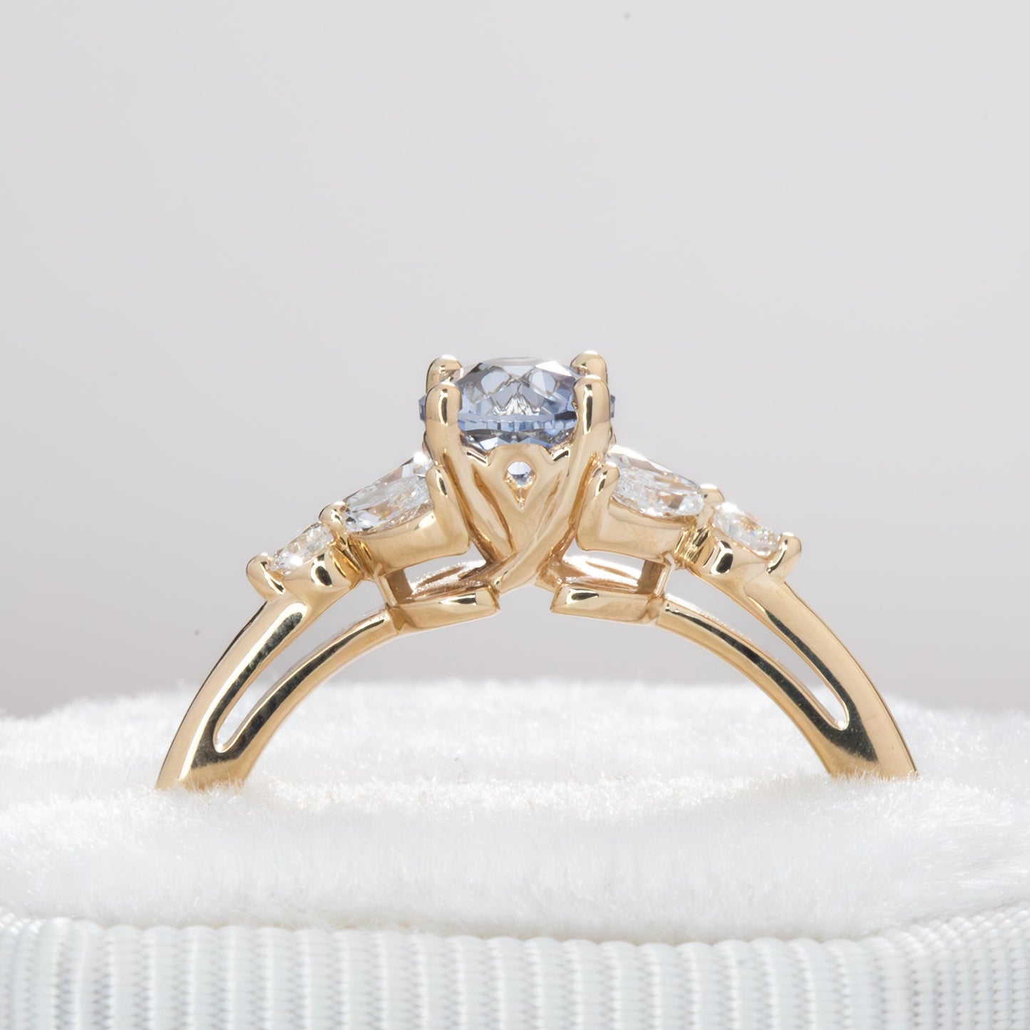 lili floral engagement ring with blue sapphire