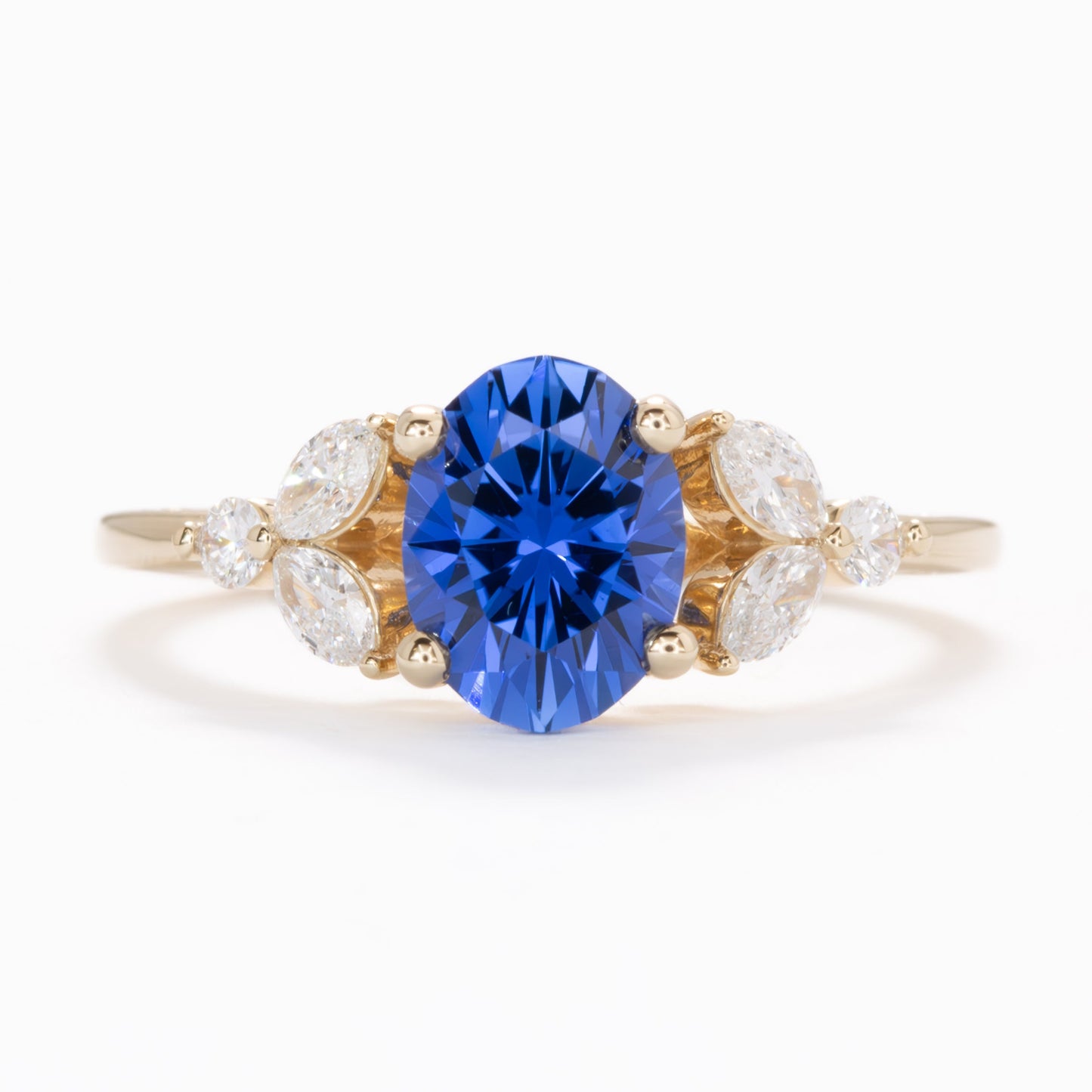 lili floral inspired engagement ring with oval lab sapphire