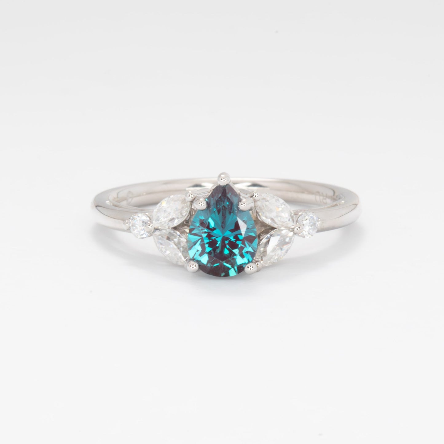 lili floral inspired engagement ring with pear lab alexandrite
