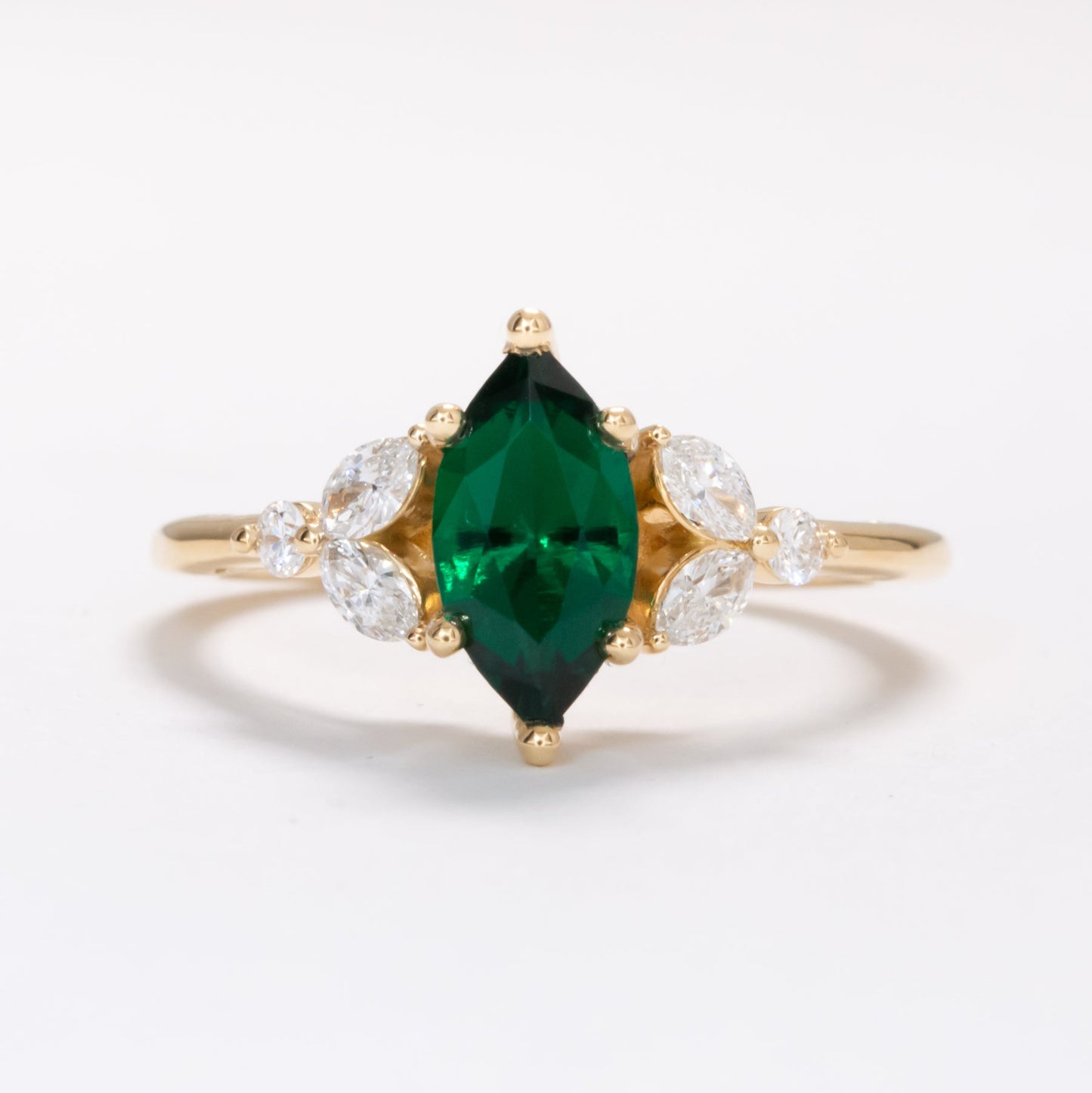 lili ring with marquise cut lab emerald