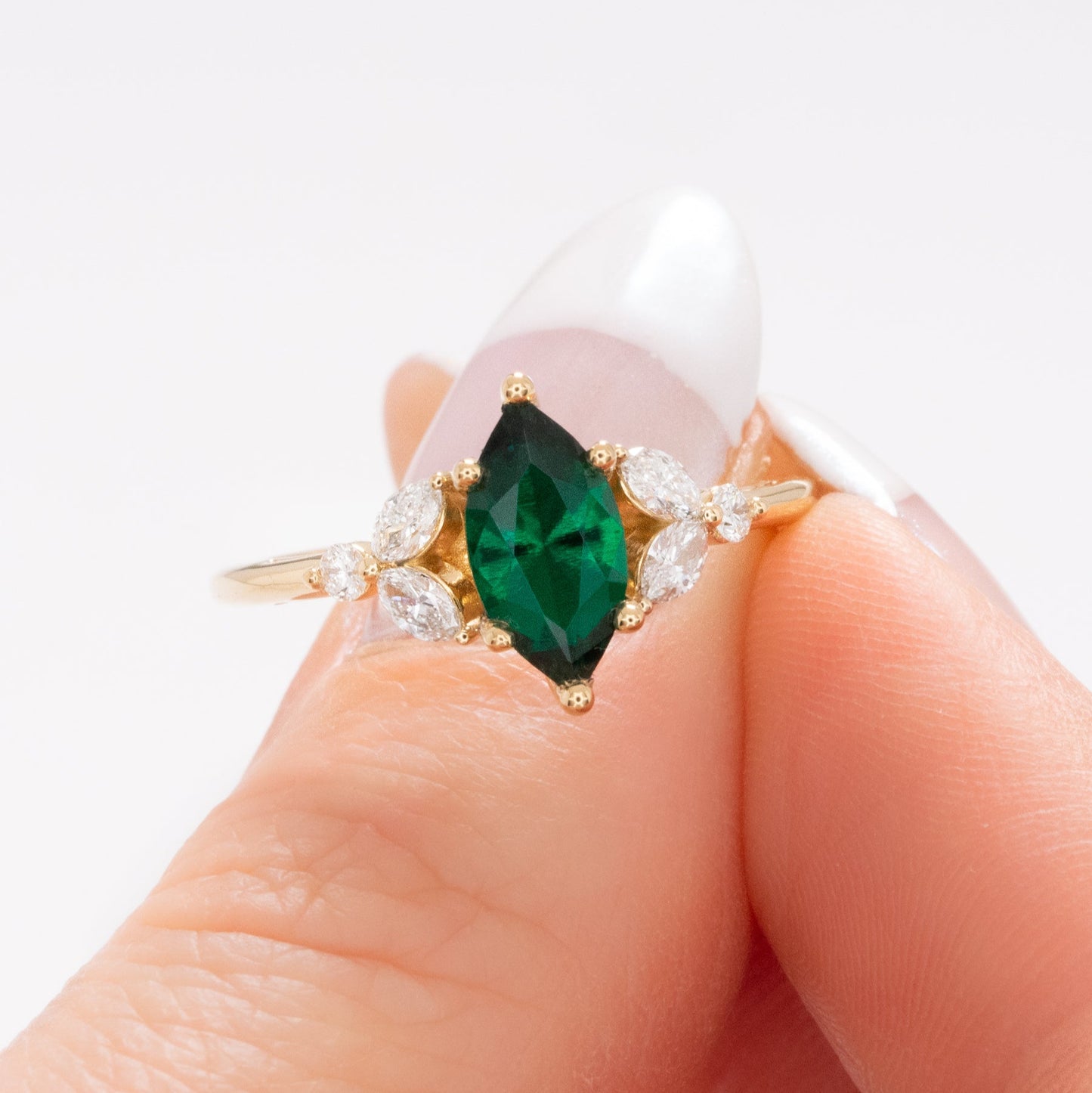 lili ring with marquise cut lab emerald