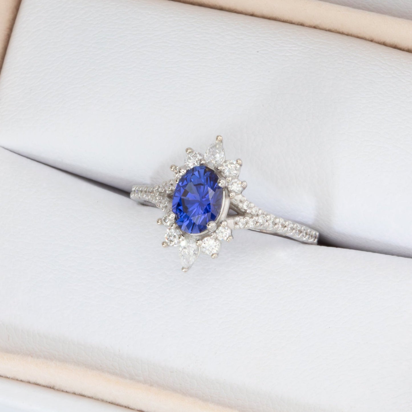 luna halo engagement ring with blue lab sapphire