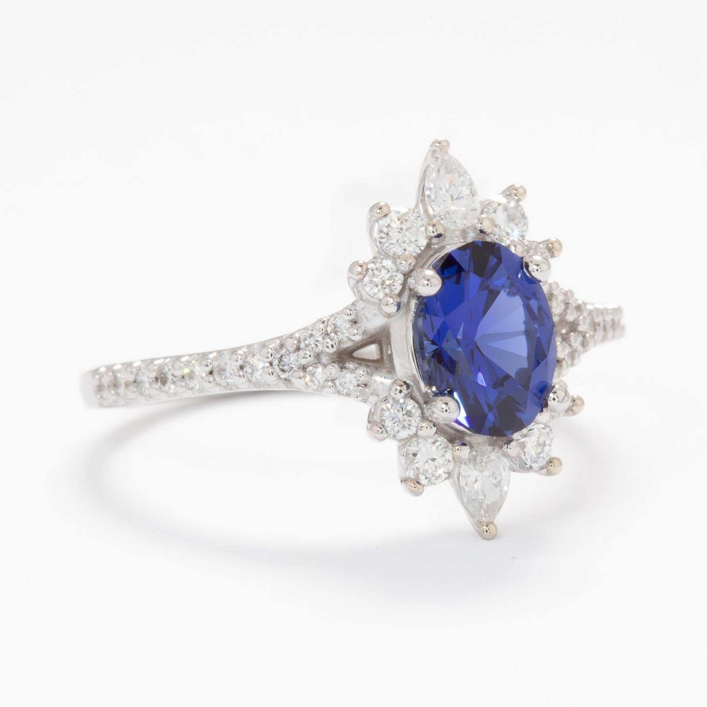 luna halo engagement ring with blue lab sapphire