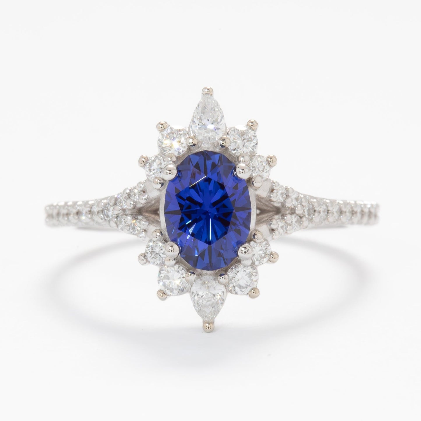 luna halo engagement ring with blue lab sapphire