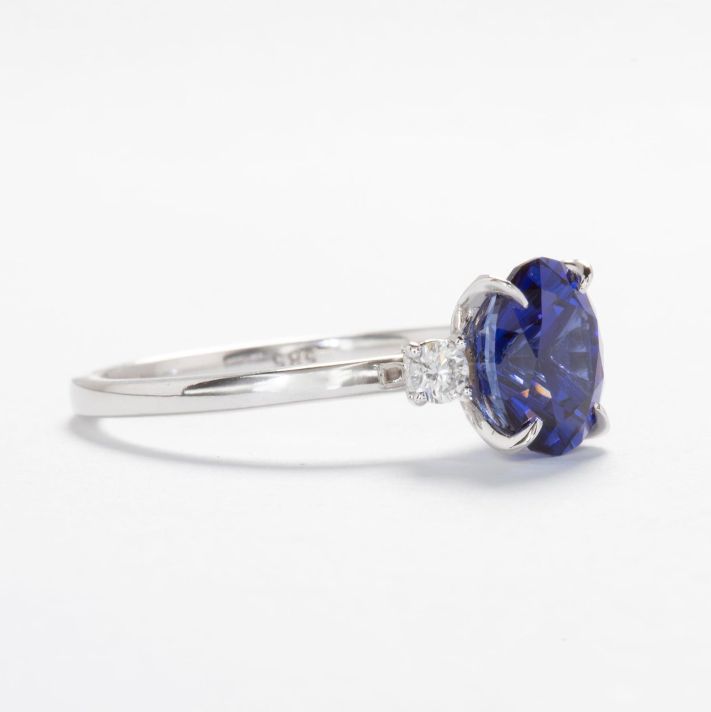 mabel nature inspired petal basket ring with oval blue lab sapphire