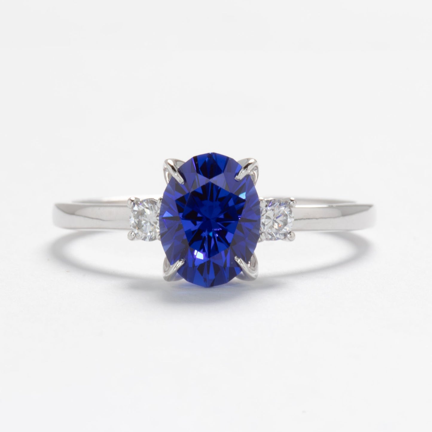 mabel nature inspired petal basket ring with oval blue lab sapphire