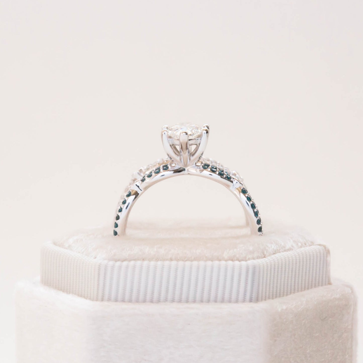 custom marquise lab diamond engagement ring with teal accents