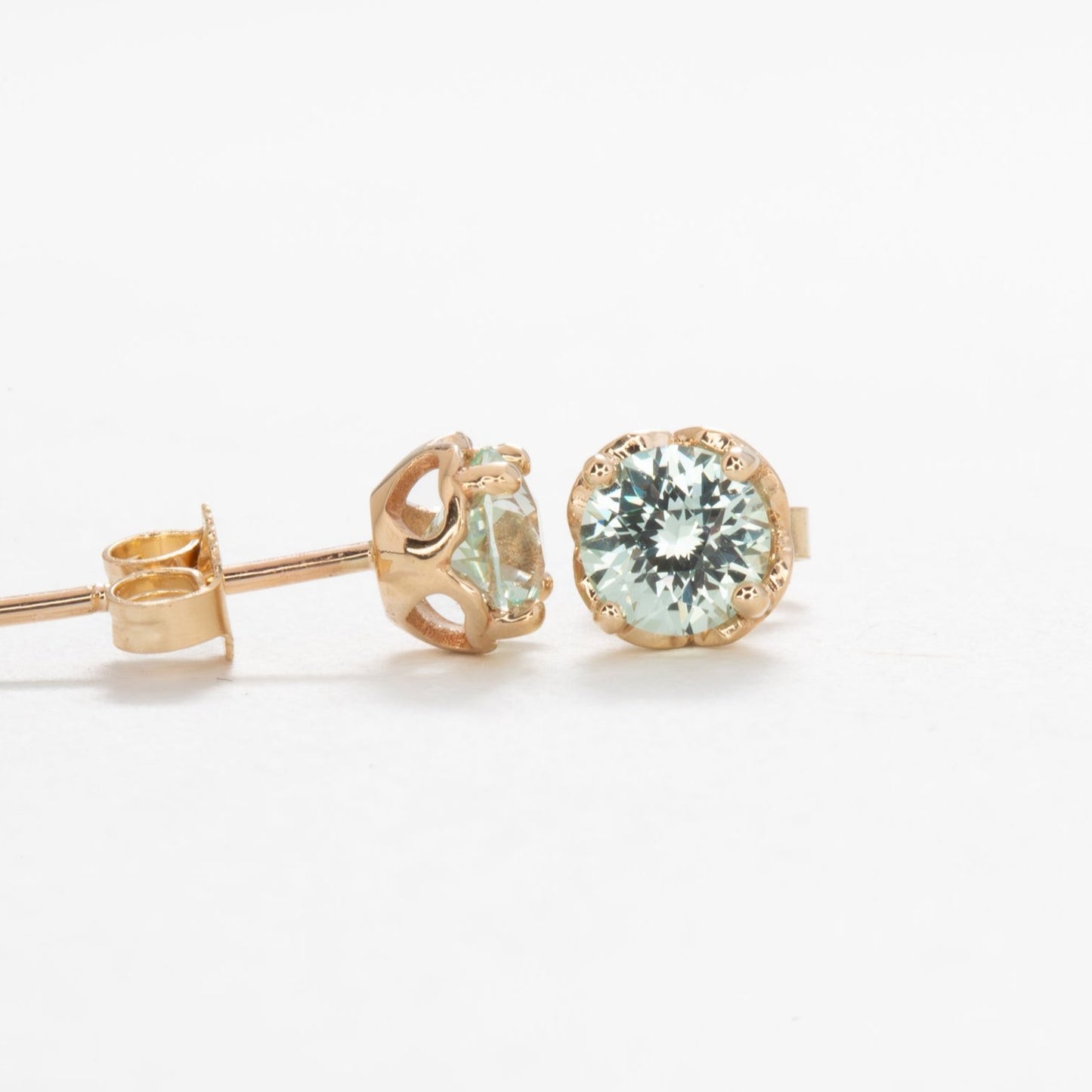 mint lab sapphire earrings in yellow gold