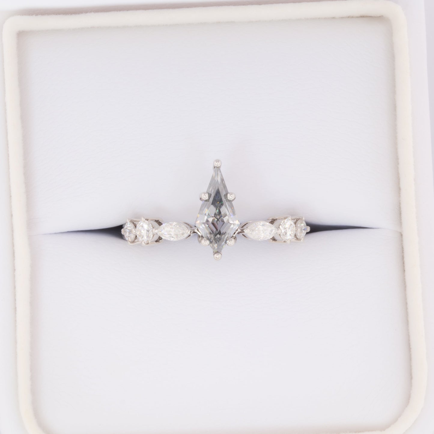 grey moissanite kite engagement ring