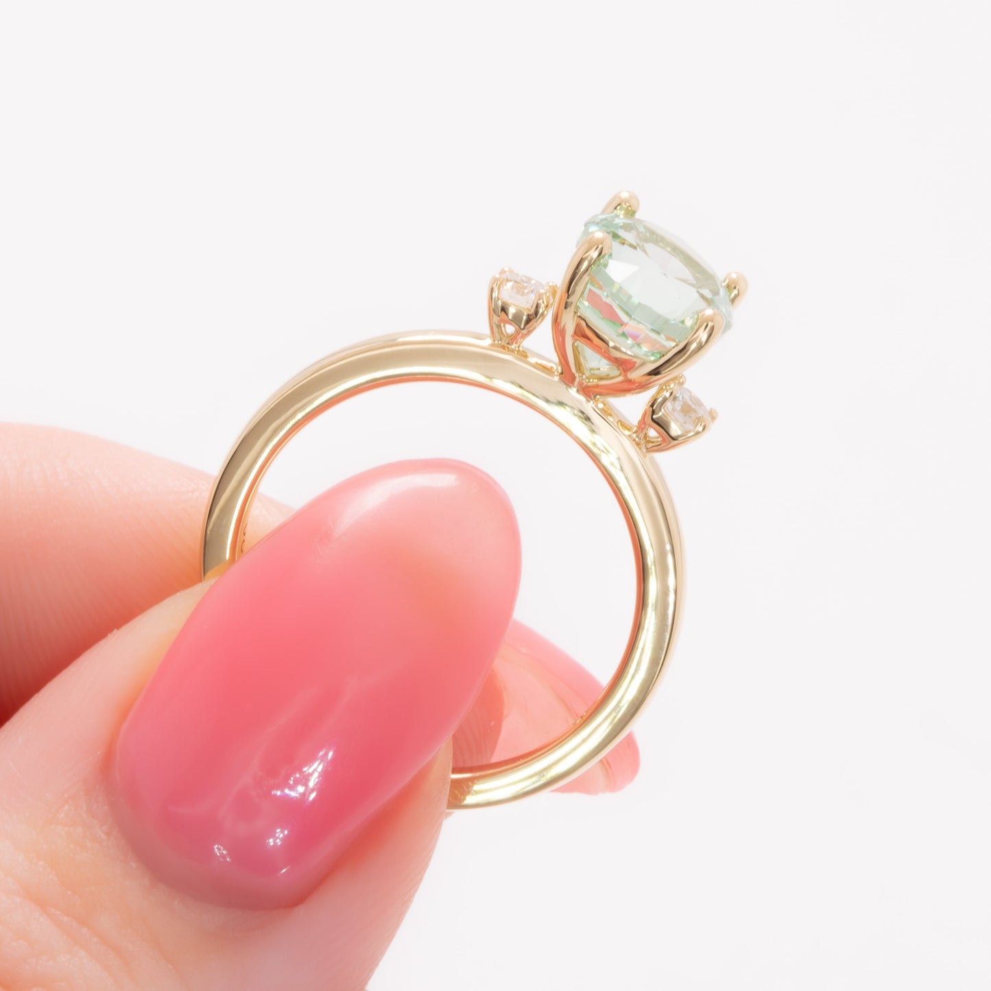 naomi three stone engagment ring with mint oval lab sapphire