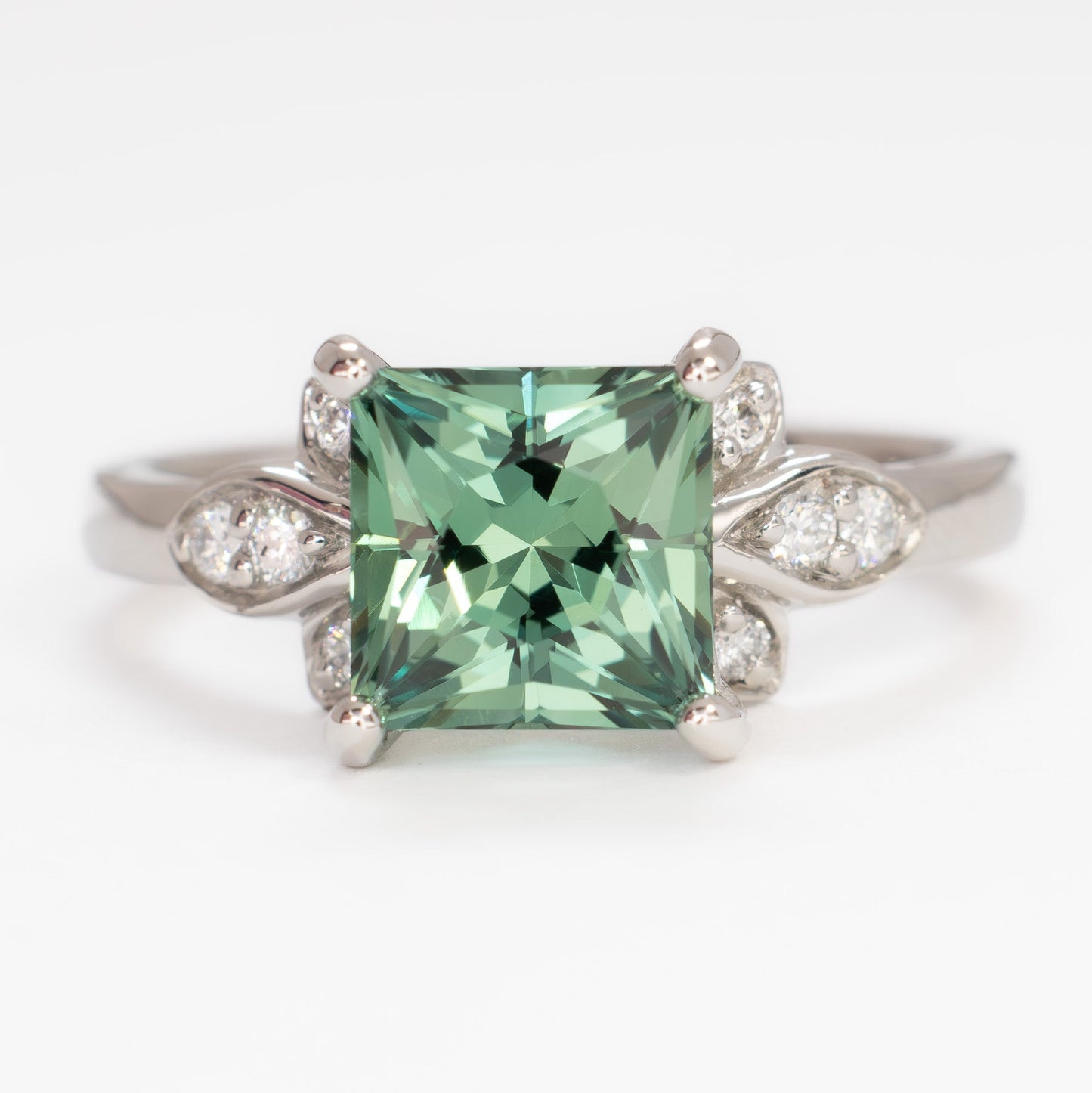 nature inspired azalea ring with green lab sapphire princess cut