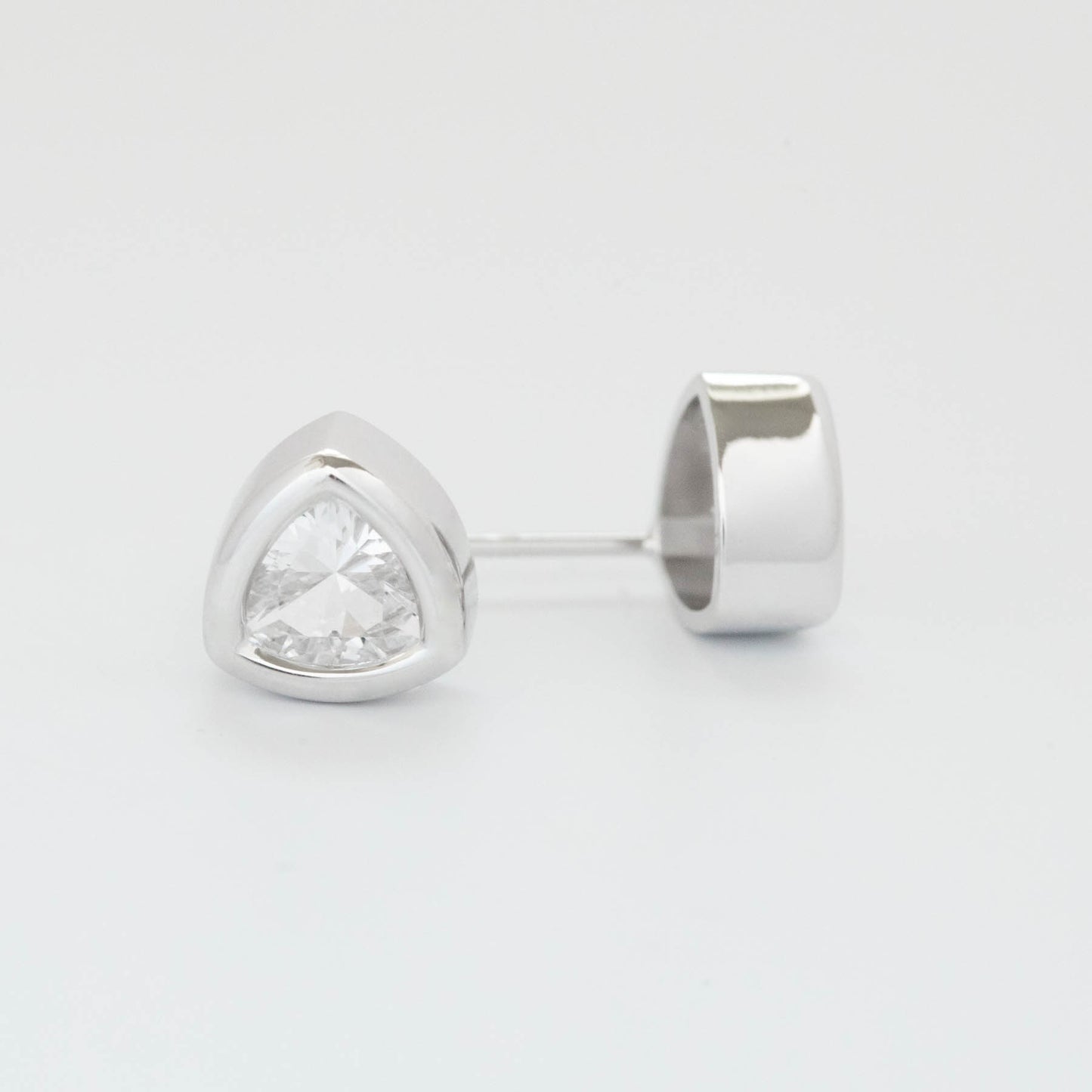 bezel set white sapphire earrings