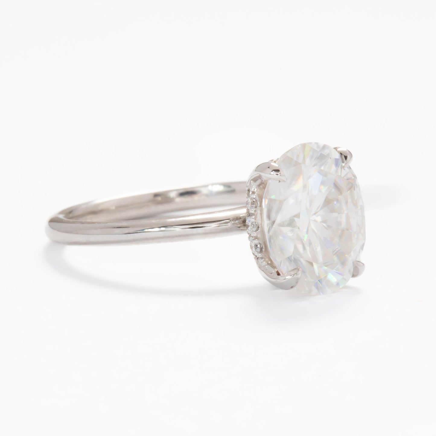 oval moissanite hidden halo engagement ring