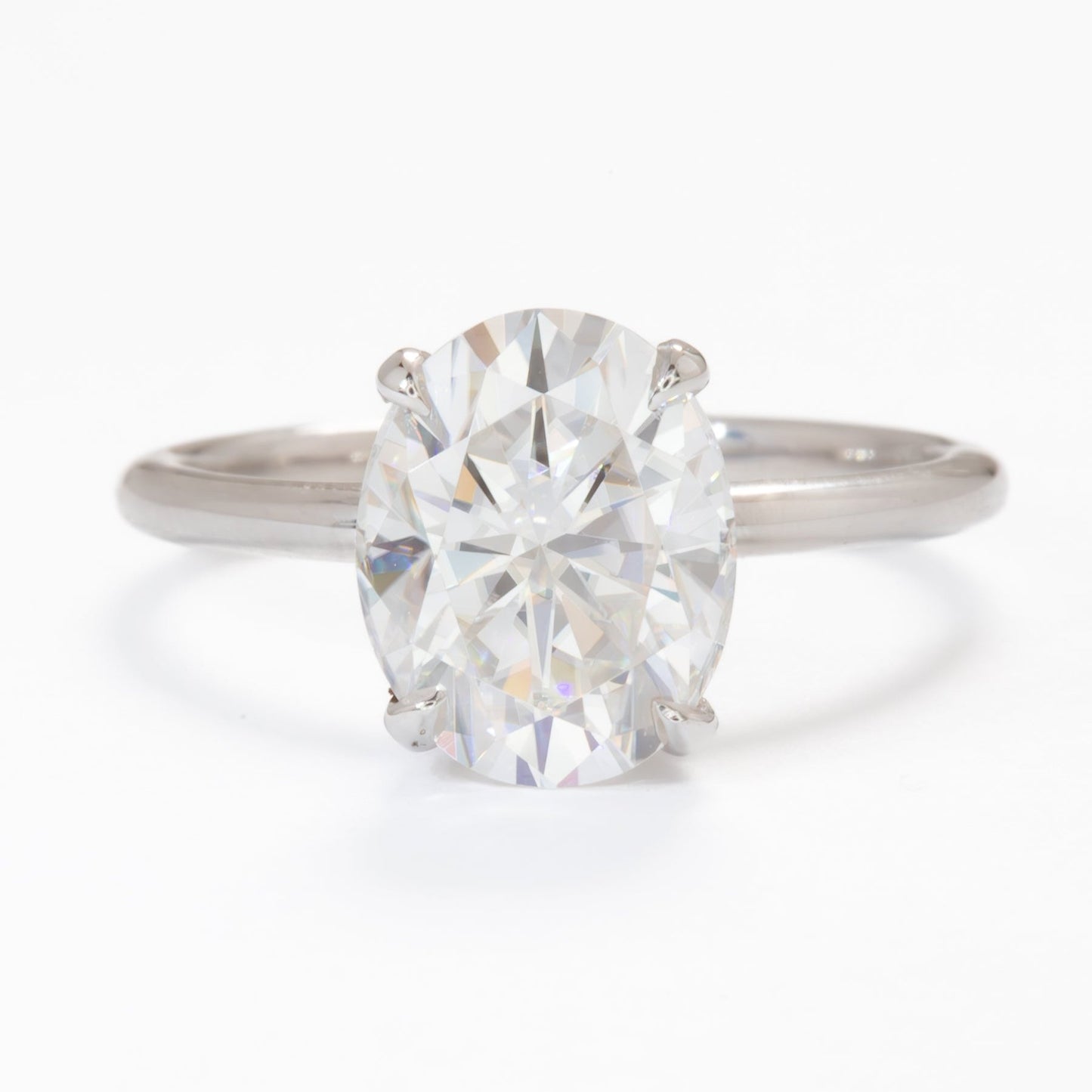 oval moissanite hidden halo engagement ring