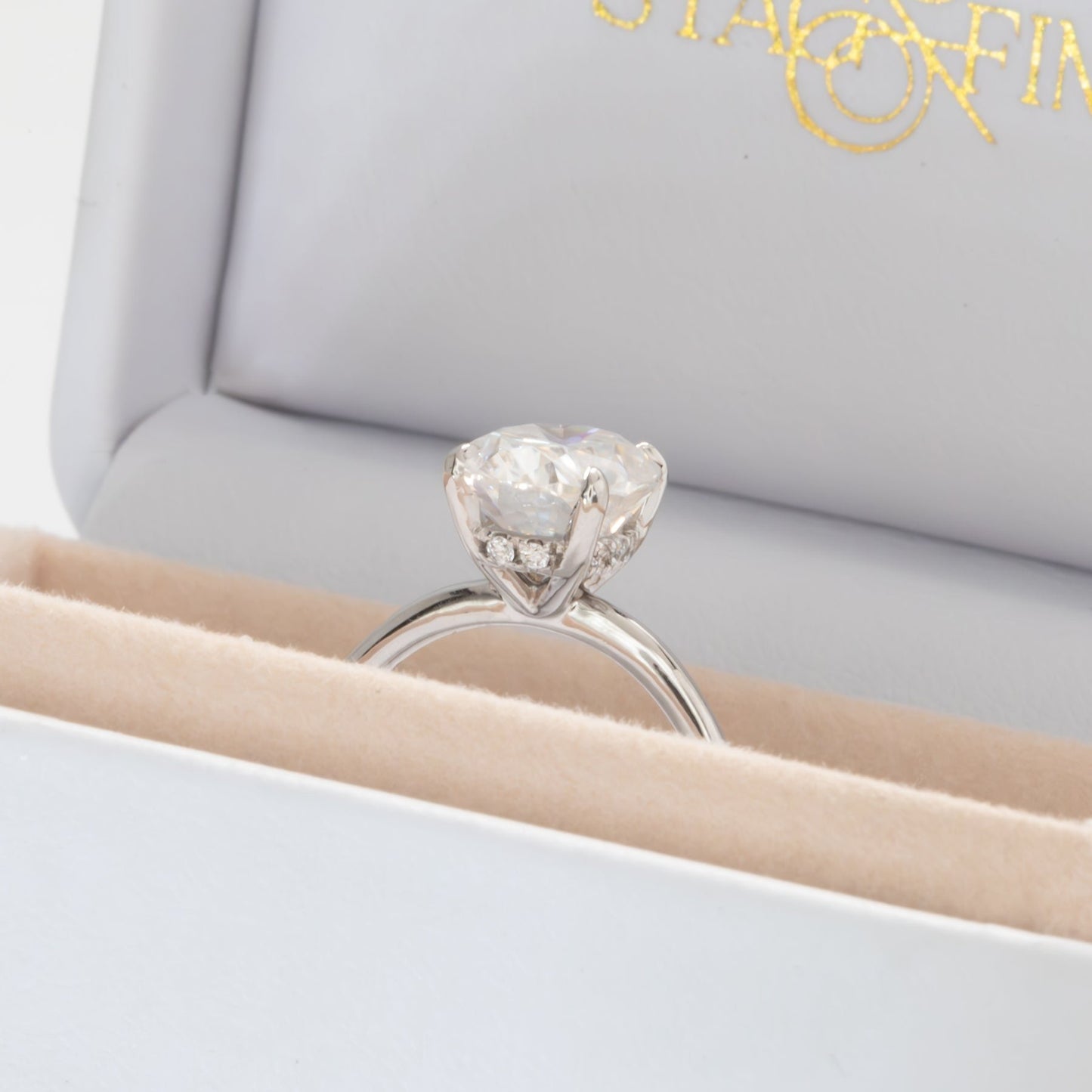 oval moissanite hidden halo engagement ring