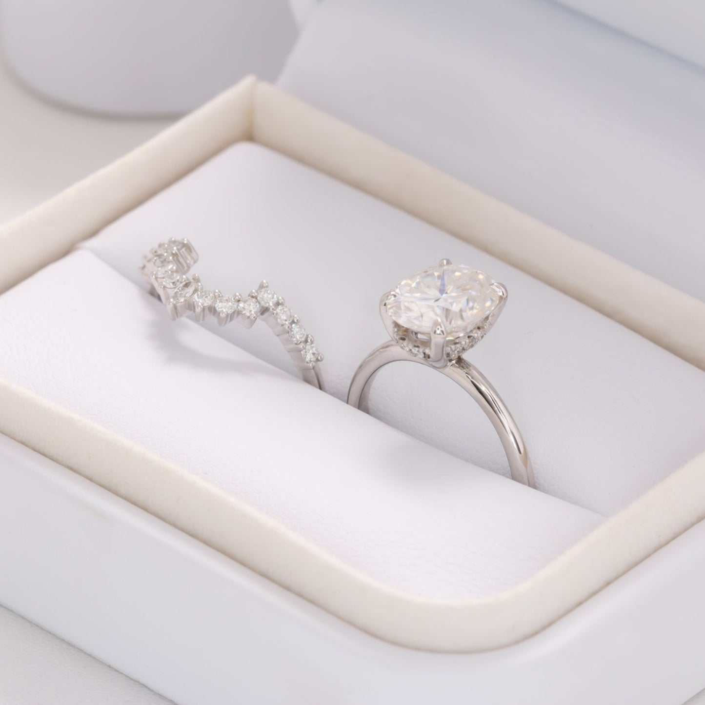 oval moissanite hidden halo engagement ring