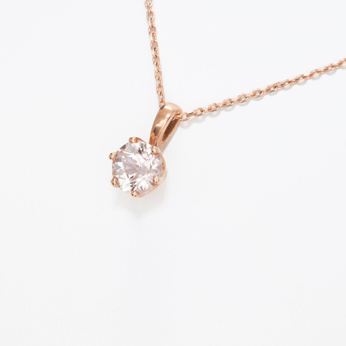 pale pink lab sapphire in rose gold necklace