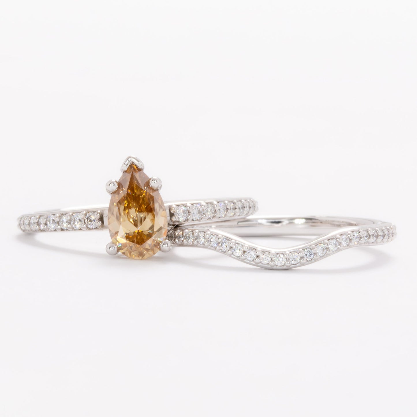 pear gold moissanite engagement ring in white gold