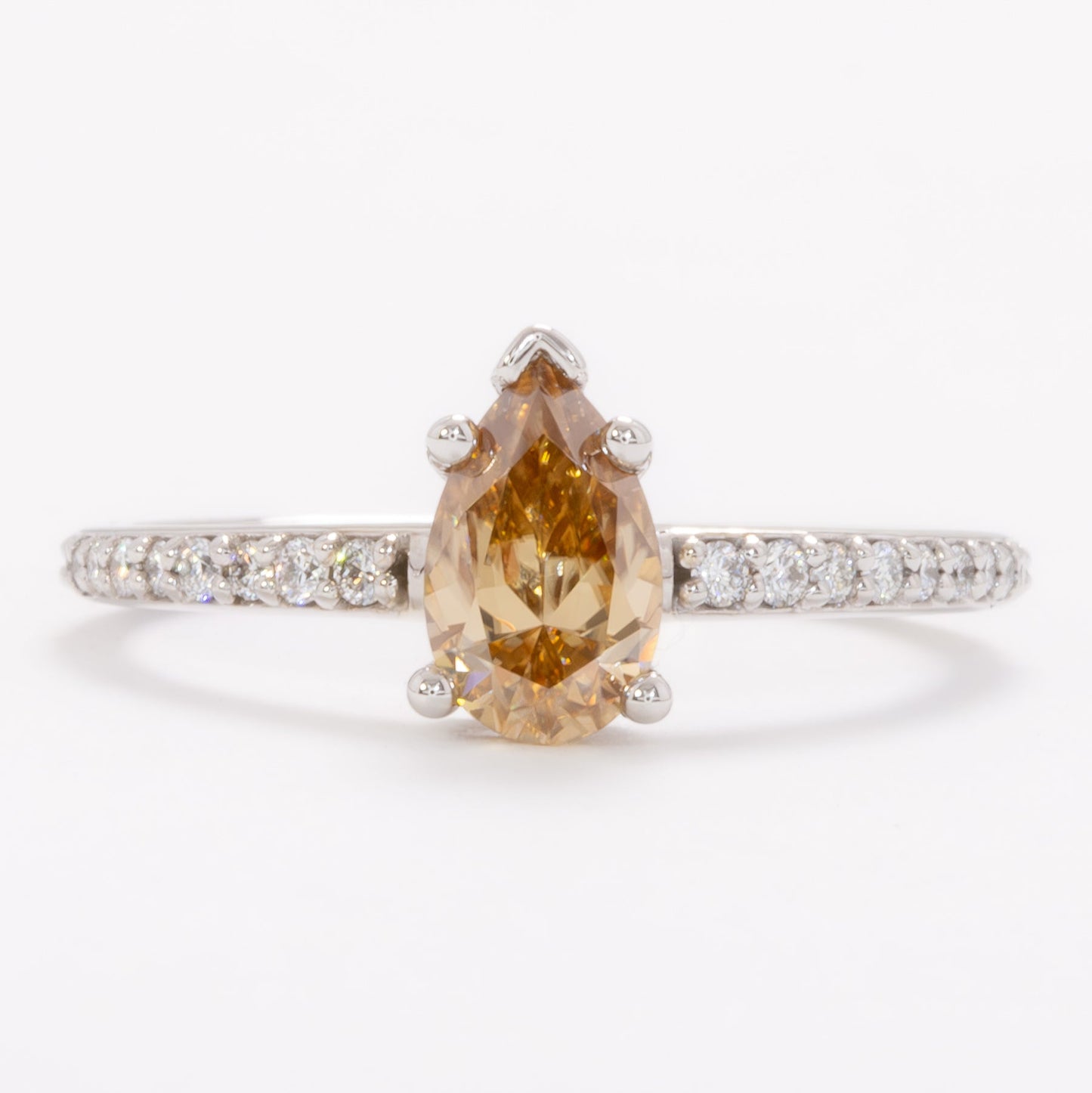 pear gold moissanite engagement ring in white gold