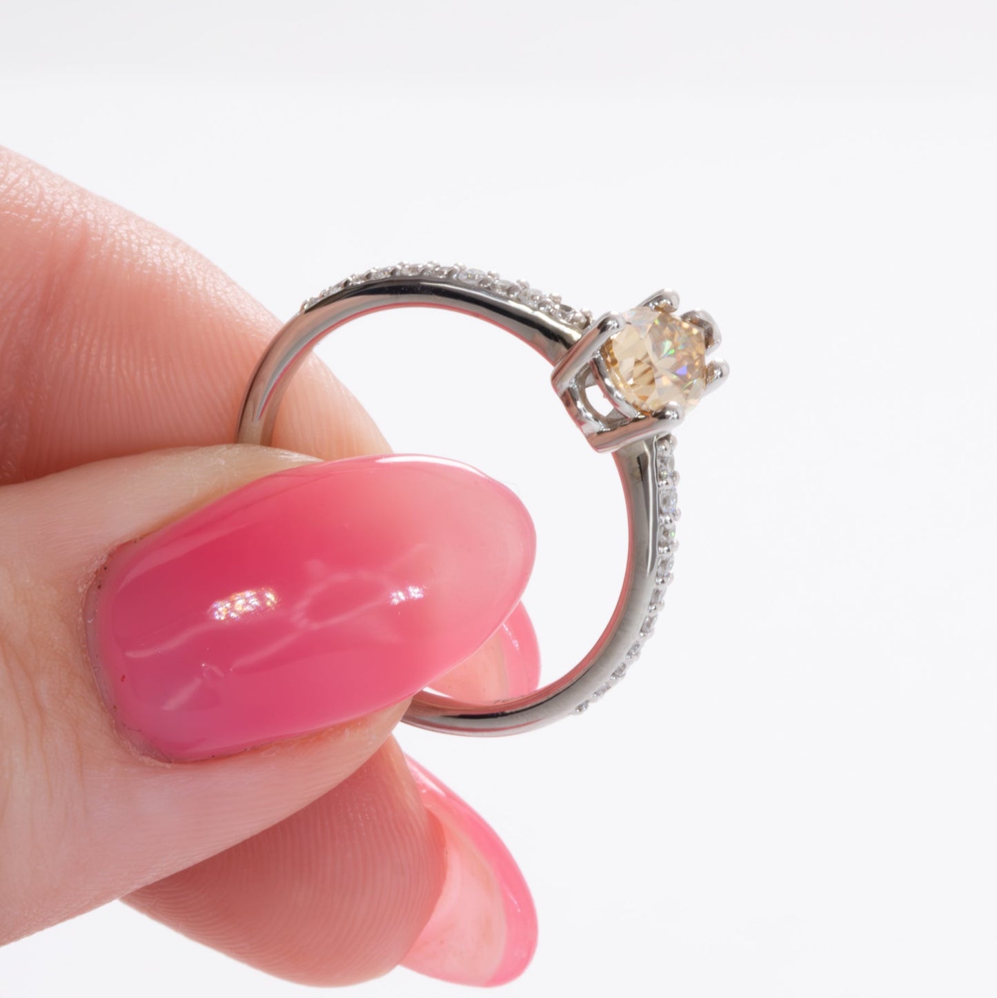 pear gold moissanite engagement ring in white gold