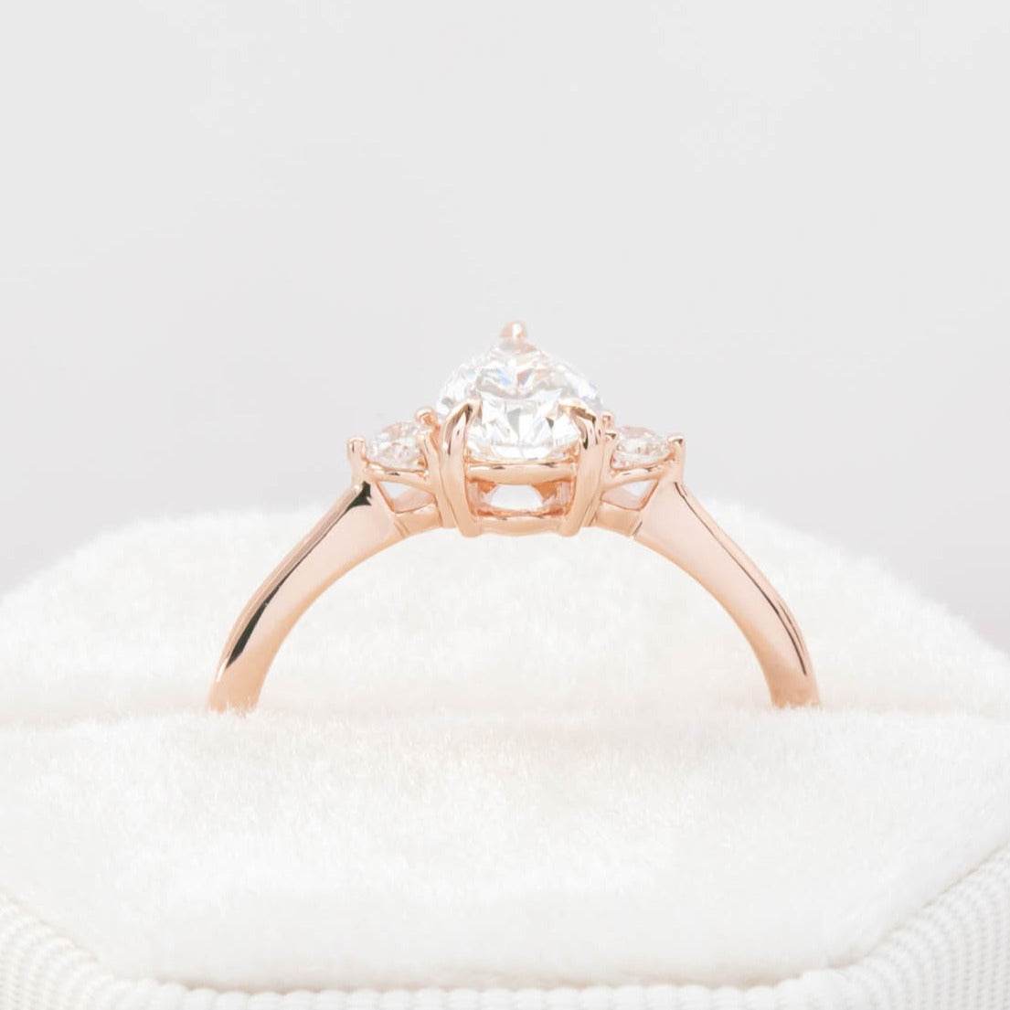 lab diamond pear 3 stone engagement ring in rose gold