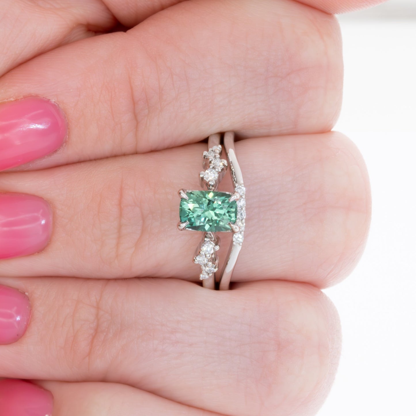 penelope wedding set with elongated cushion green lab sapphire