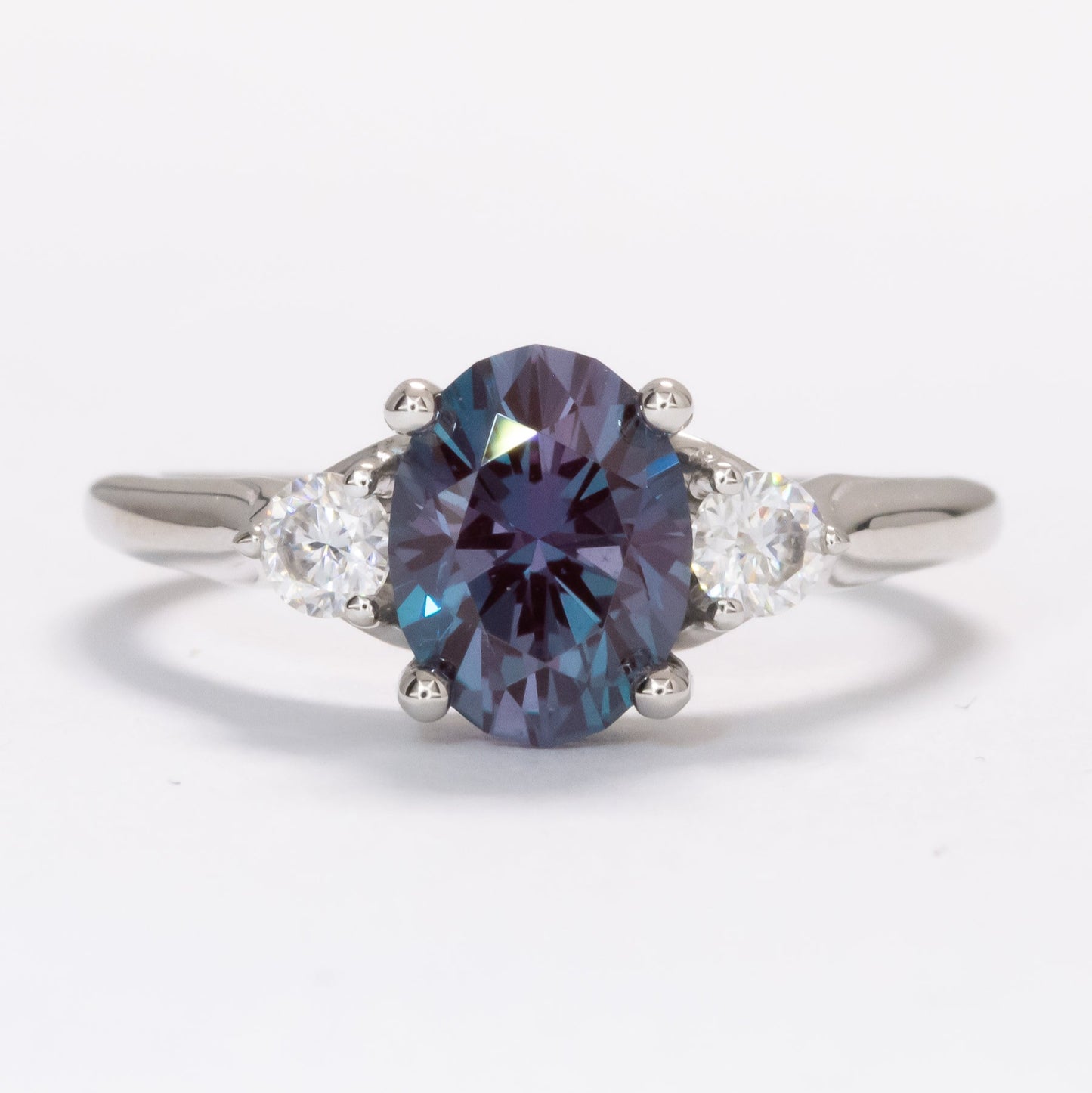 robin three stone engagement ring with oval lab alexandrite